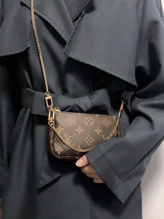 Sac accessoires Louis Vuitton monogramme pochette authentique