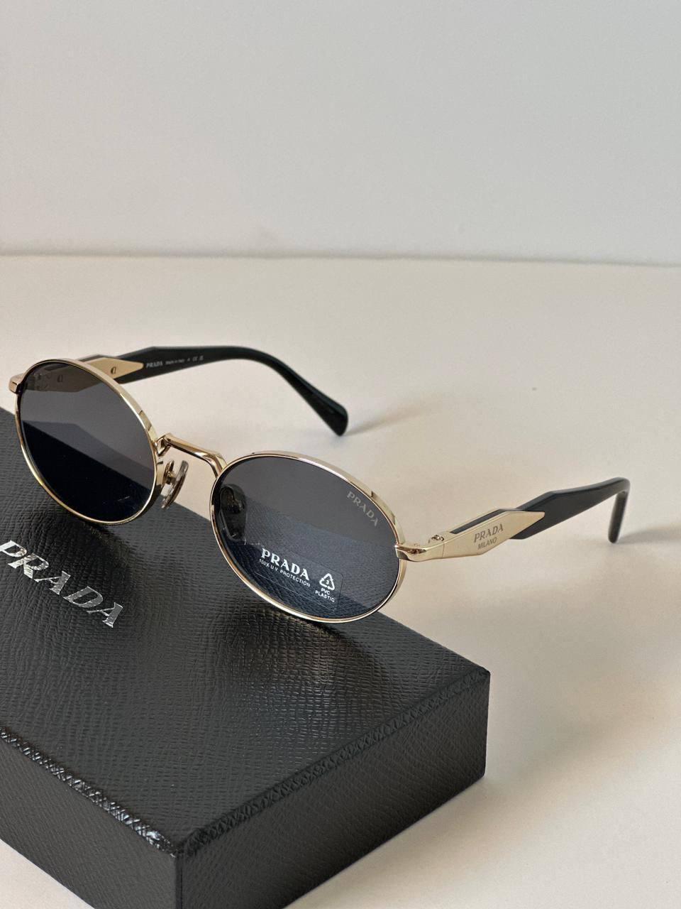 Solaires Prada PR 65ZS ZVN70L